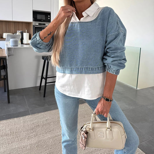 Modieuze twee-delige set bestaande uit een lange mouwen spijkerblouse en een broek voor vrouwen